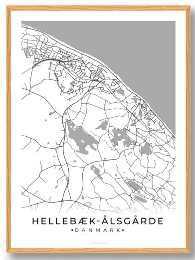 Hellebæk-Ålsgårde map poster in a light wood frame. Black and white minimalist design showing street layout and coastline.