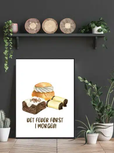 Kageplakat med hvid baggrund og teksten ”Det feder først i morgen”.