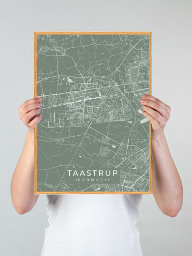 Taastrup by plakat med grøn baggrund. Taastrup byplakaten viser Taastrup fra sin smukkeste side