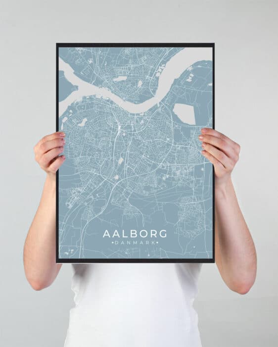 Aalborg Plakat in green. Detailed map of Aalborg, Denmark held by a person. Minimalist design, perfect for home decor.