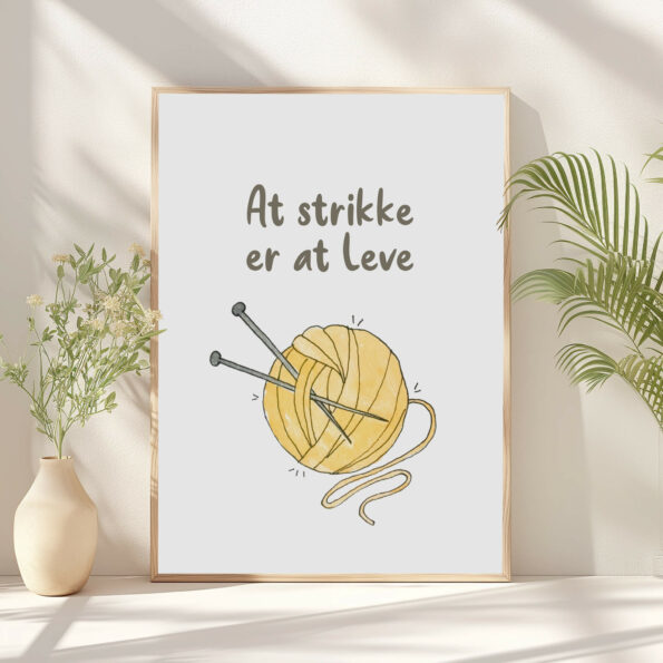 Strikkeplakat til hjemmet: Illustration af garnnøgle og strikkepinde. "At strikke er at leve".