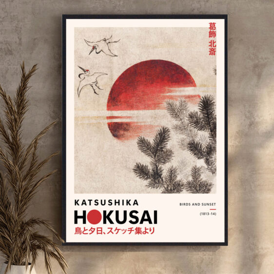 As the sun sets behind the horizon, birds fly gracefully in the fading light. The sky is painted with deep reds and purples, while the birds add movement and life to the calm, evening atmosphere.