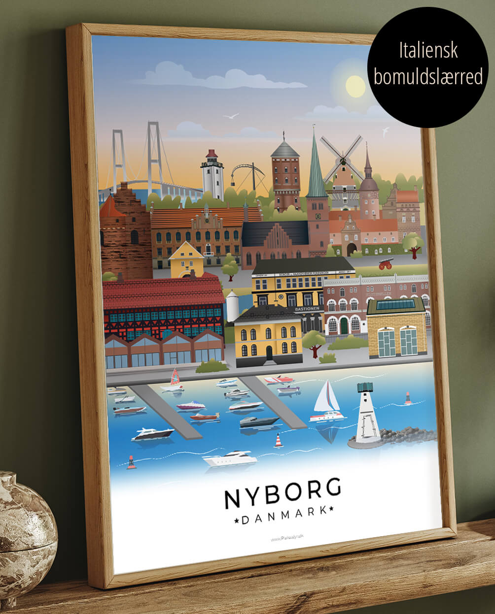Canvasbillede med Nyborg i farver, der er indrammet i egeramme